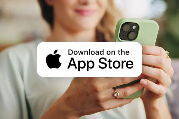 Woman holding phone with App Store download icon imposed over image