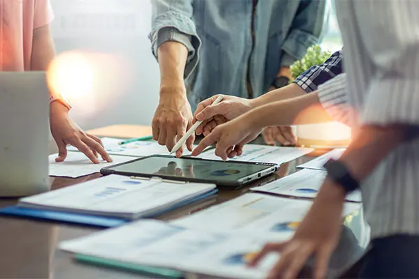 Business people reviewing documents